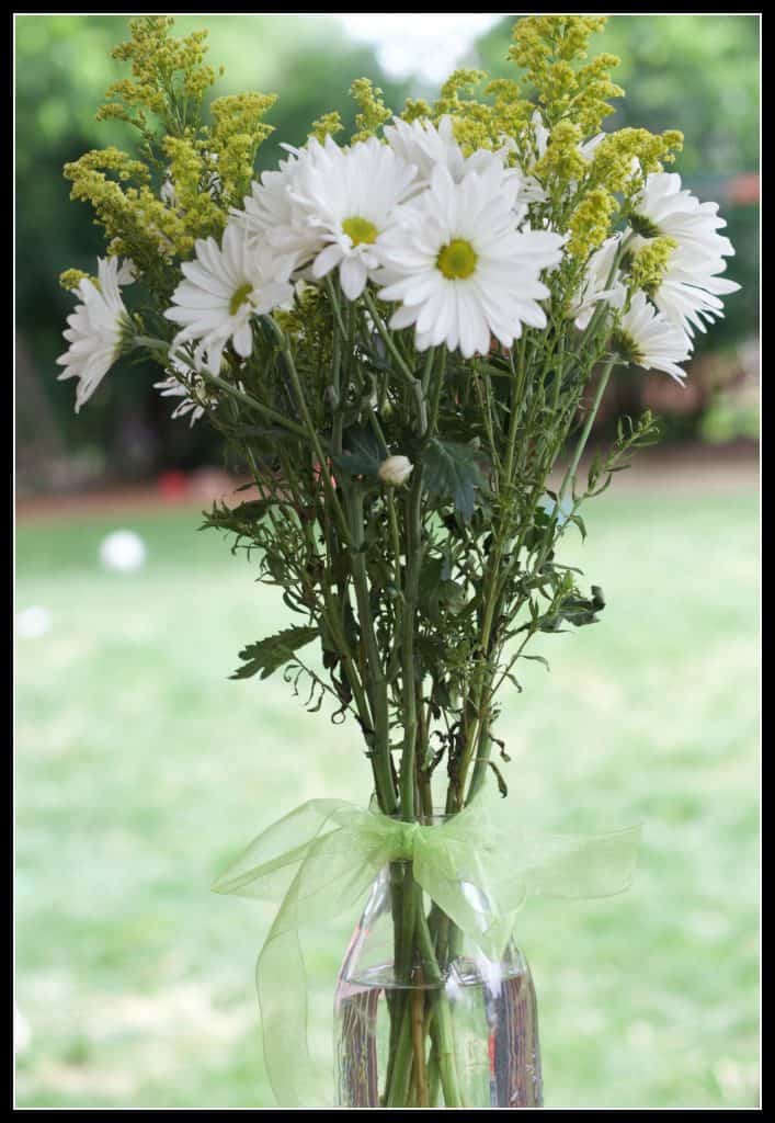 Yellow and white tennis themed flowers