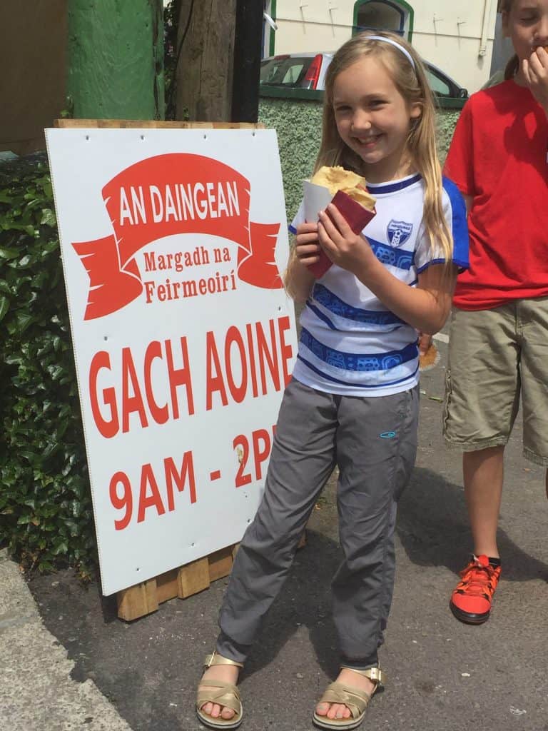 Ireland With Kids - Noelle eating a gluten-free crepe at the Dingle Farmers Market