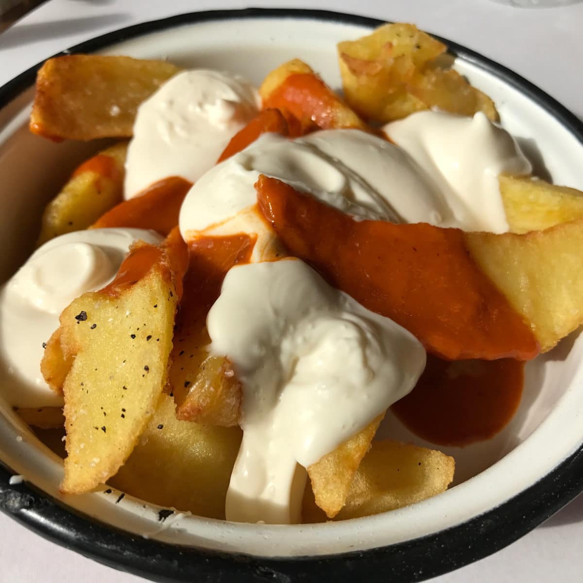Want an authentic taste of Spain? Make these amazing patatas bravas. Potatoes with a beautiful spicy paprika sauce.